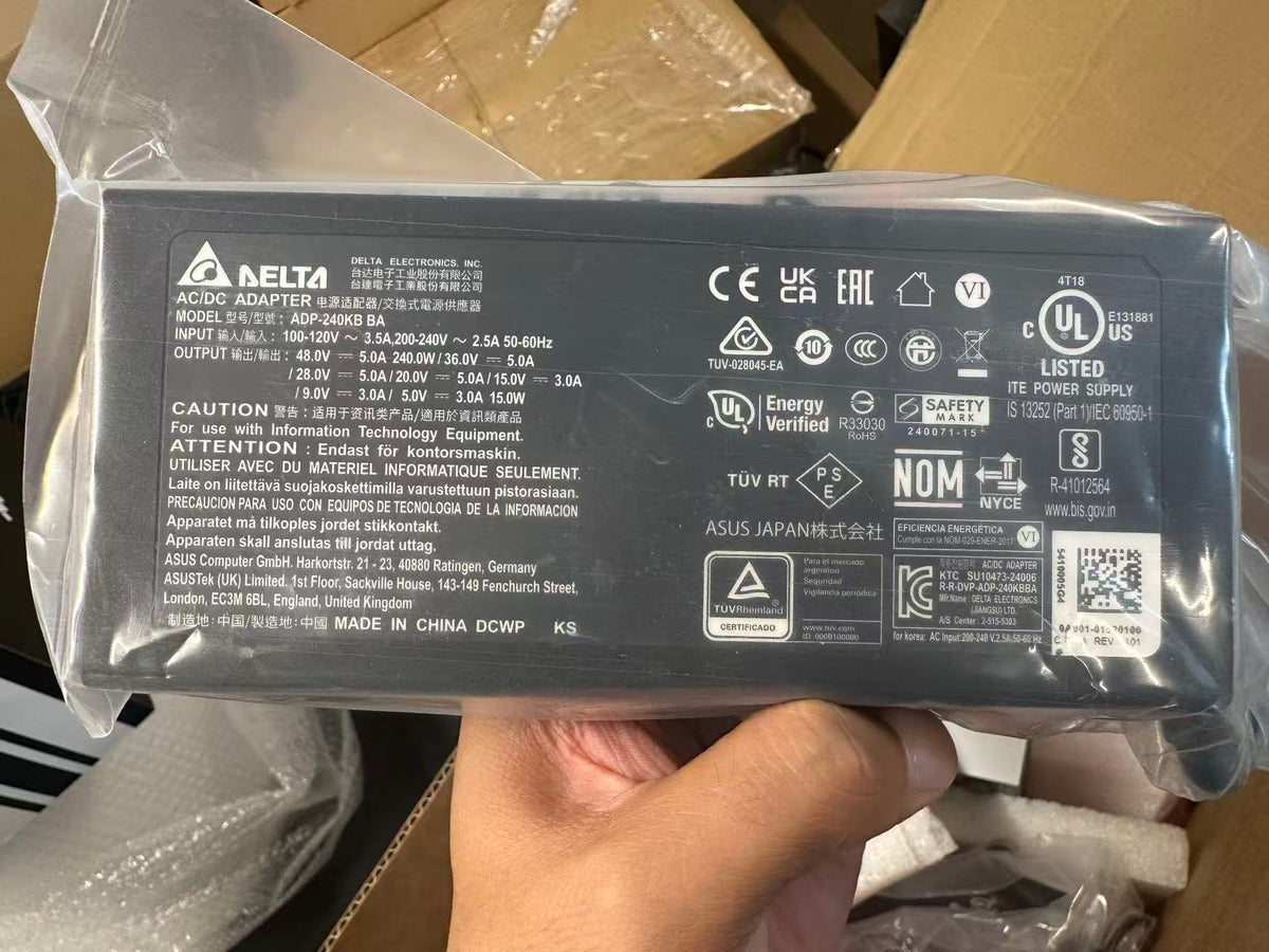 Actual unit - original 240W Delta power adapter